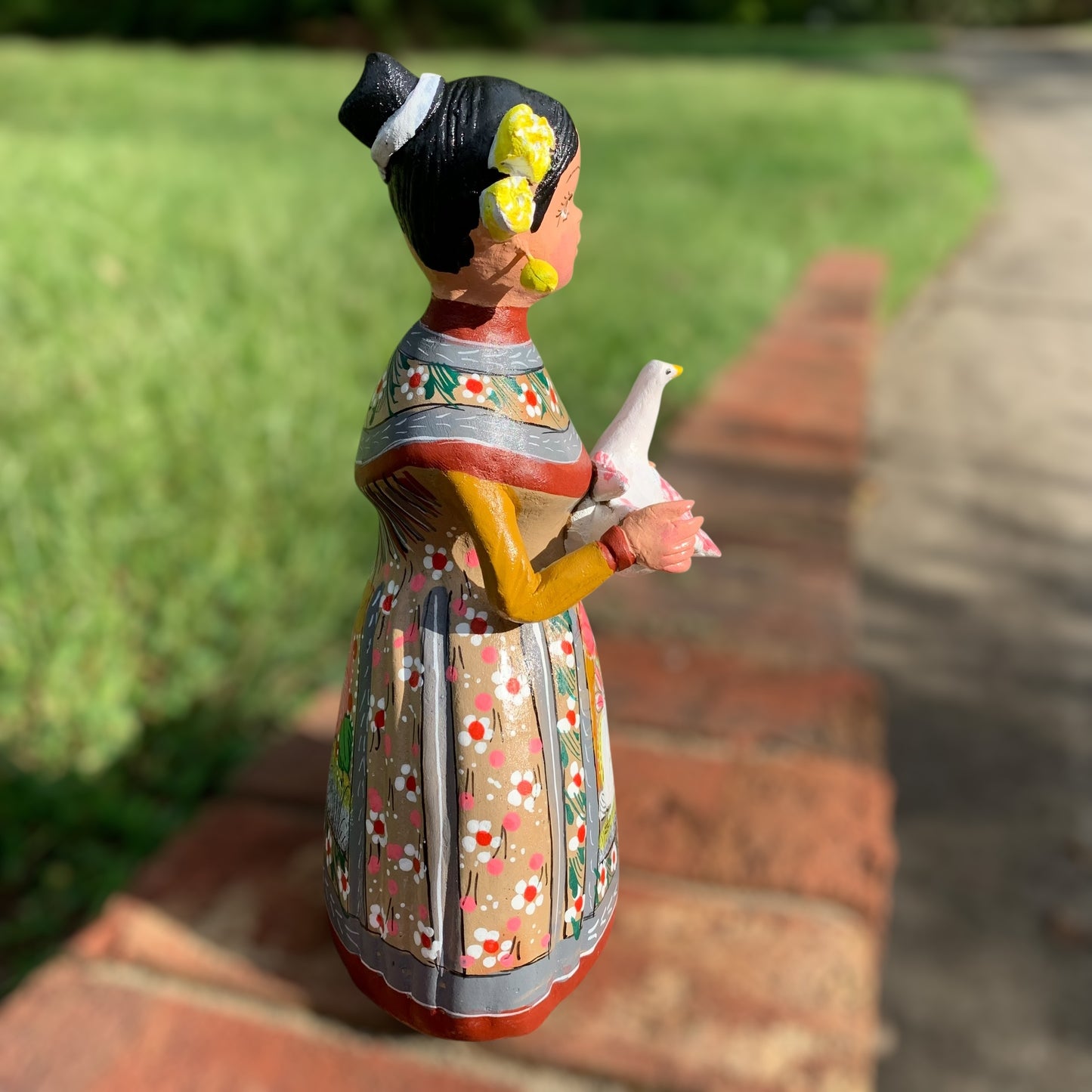 Hand painted Maria doll left side