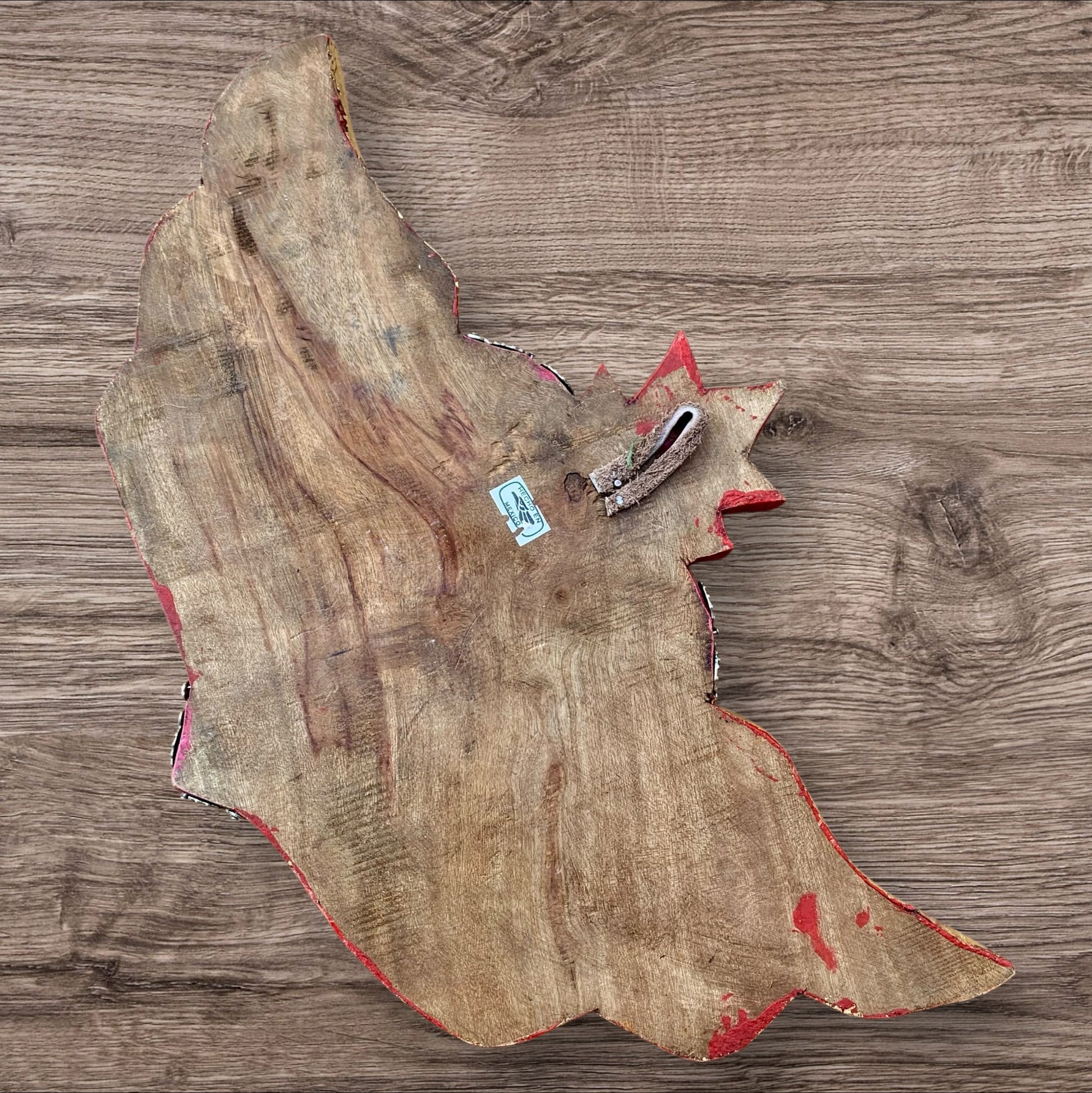 Winged Milagros sacred heart with center heart charm surrounded by sea shells Back