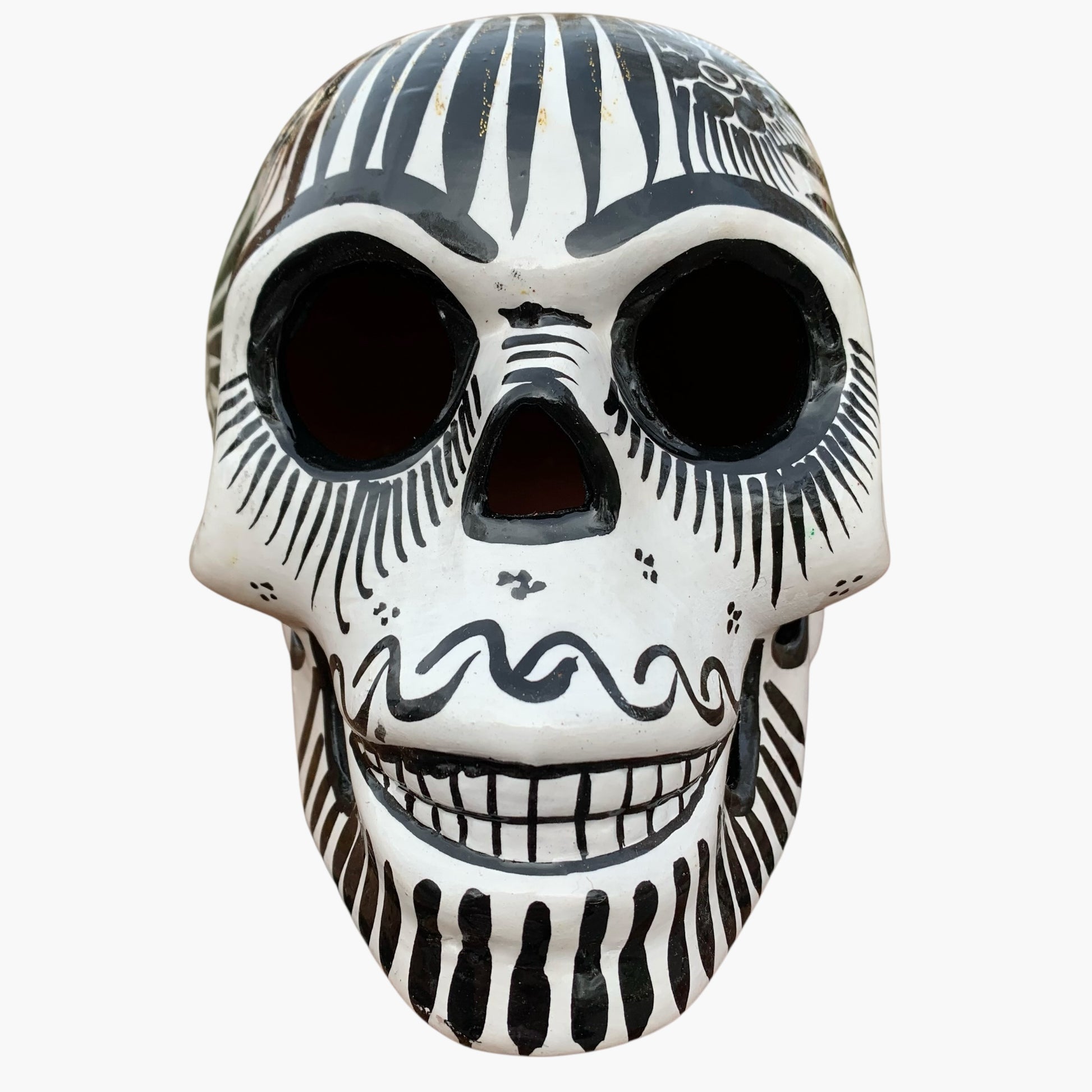  Mexican Sugar skull with vibrant designs on a white background front 