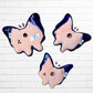 Three colorful talavera butterfly wall art pieces with blue and traditional multicolor patterns, back view.
