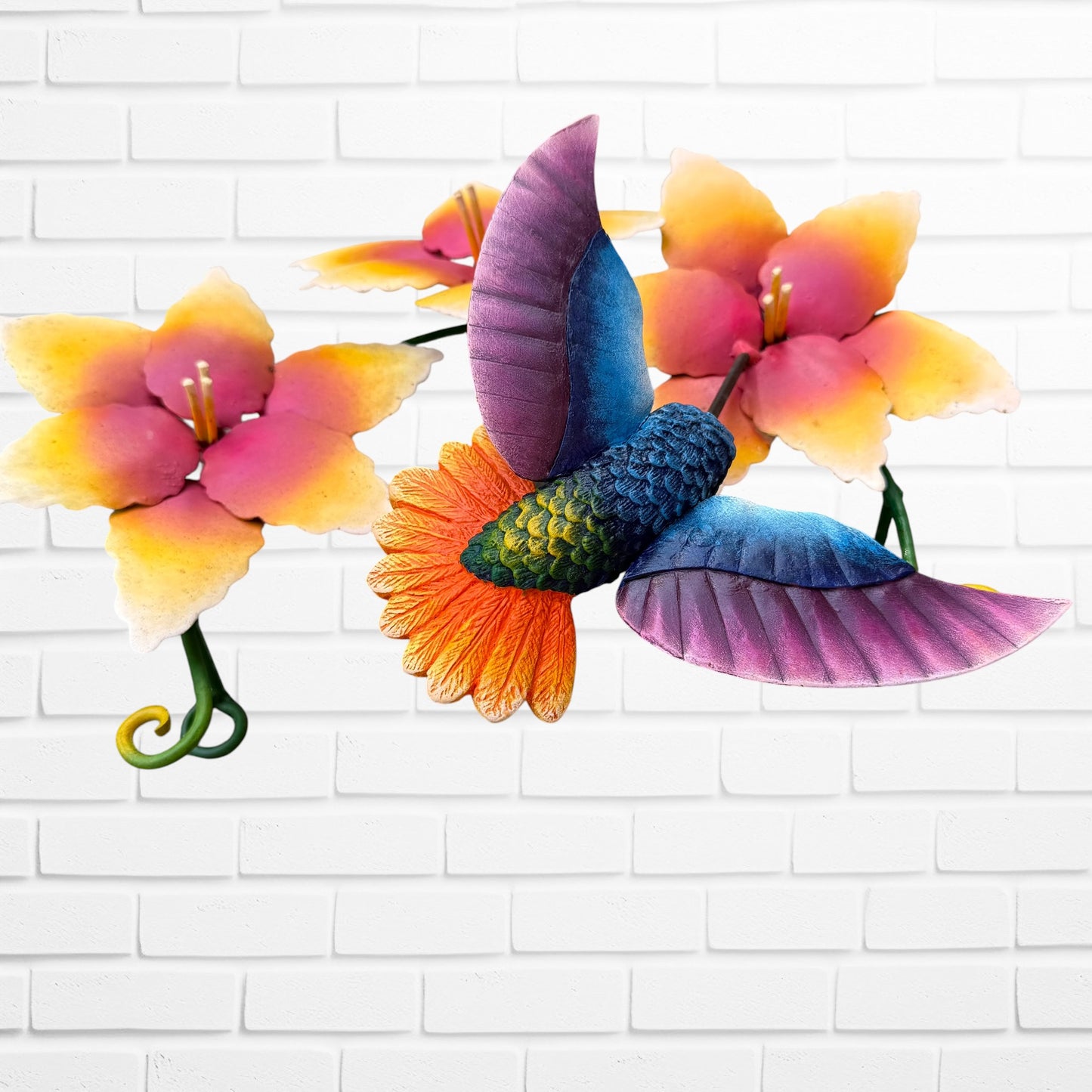 Metal hummingbird sculpture with Vibrant yellow flowers bottom view