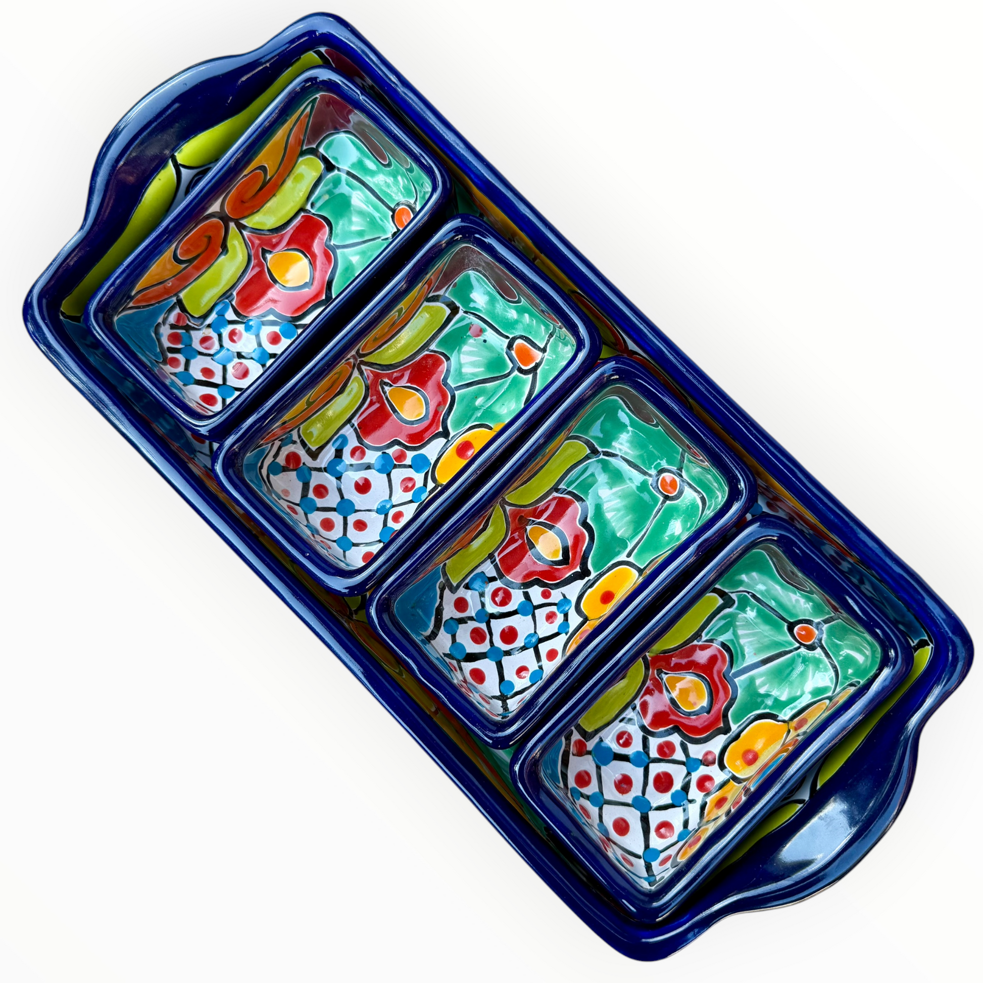 A sectional, rectangle Talavera hand-painted serving fish with a deep rectangular dish and four shallow rectangular sections, decorated with vibrant floral and geometric patterns in blue, red, green, yellow, and orange. Top view with sections in place.