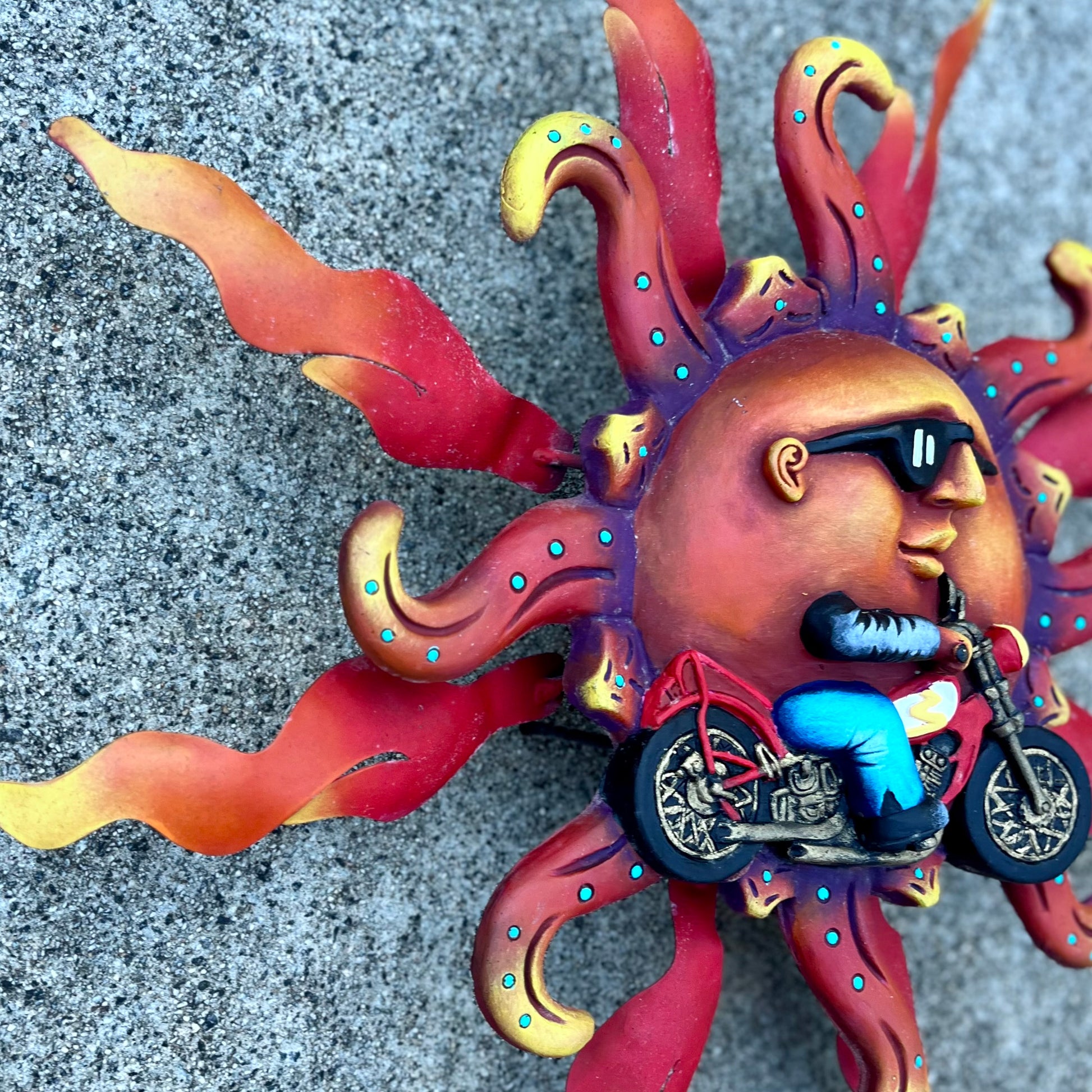 Biker Sun on wheels left