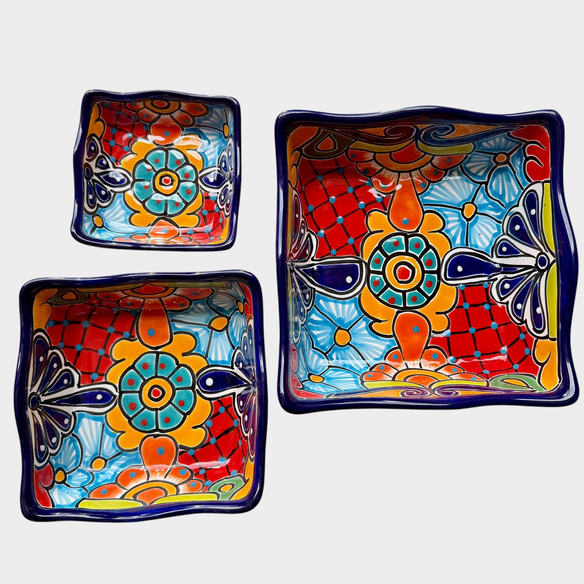Three colorful talavera square nesting bowls with intricate patterns Unnested