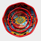 Three colorful talavera nesting bowls with intricate patterns