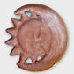 Folk art sun and moon eclipse back