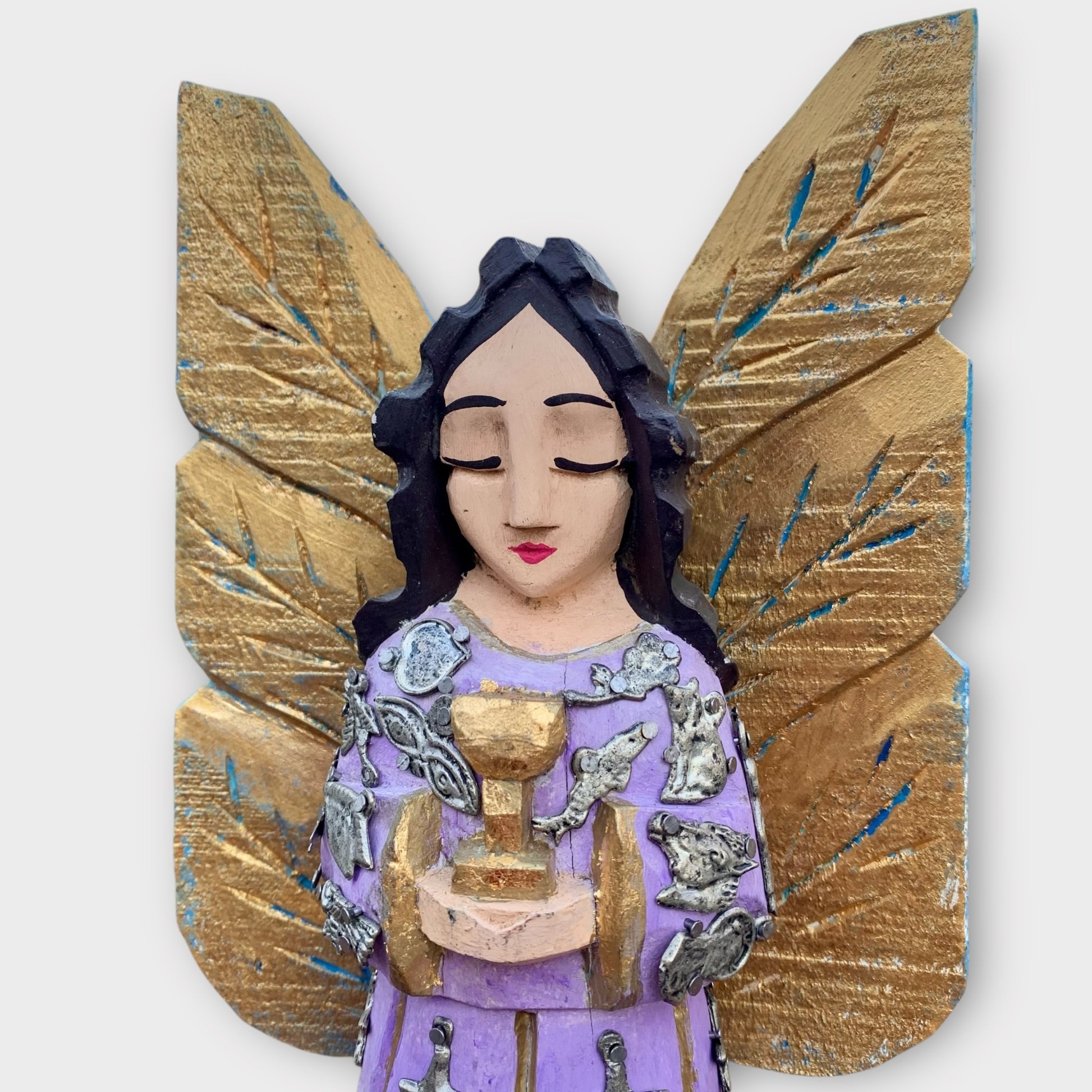 Milagros Angel Holding Goblet Face close up