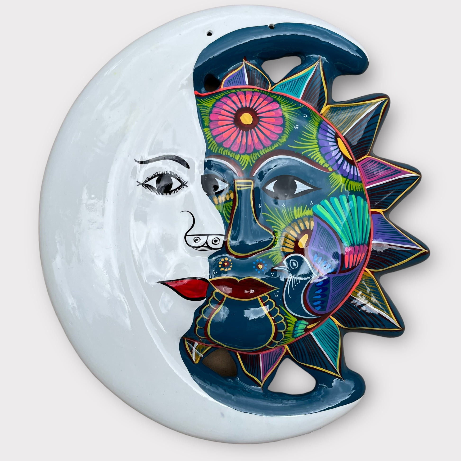 folk art mexican clay sun and moon eclipse