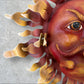 Metal wall art sun with hands rays