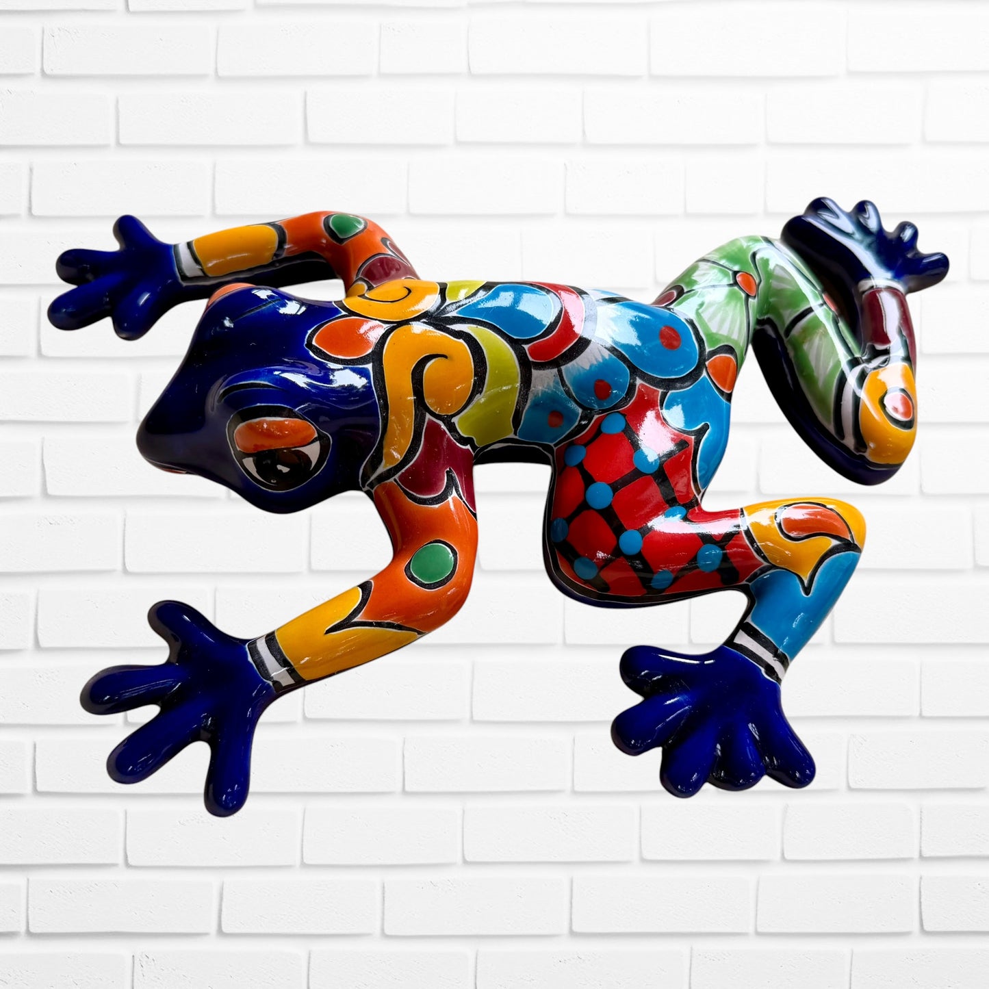 Cobalt blue Talavera wall frog right side view