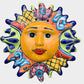 Decorative Talavera sun-shaped wall art with colorful face design on a white background