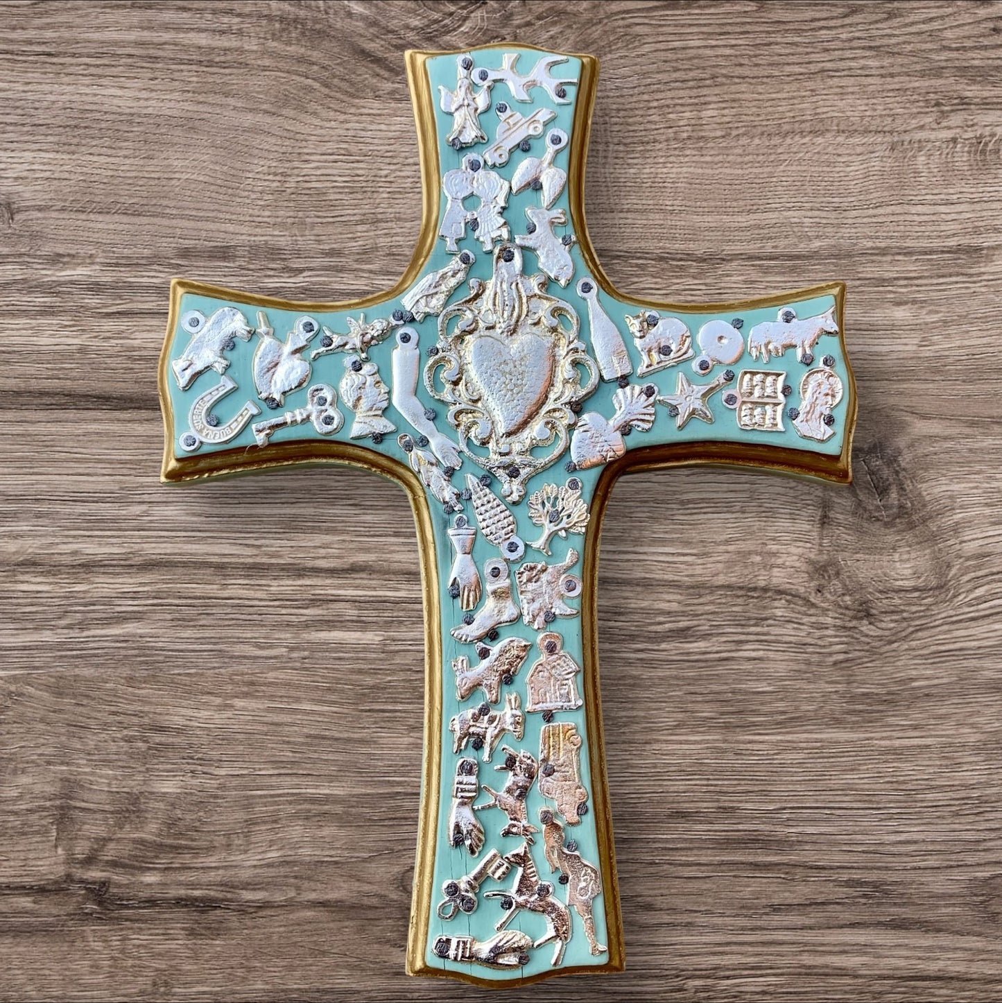 Milagros decorated wood cross teal with heart center 