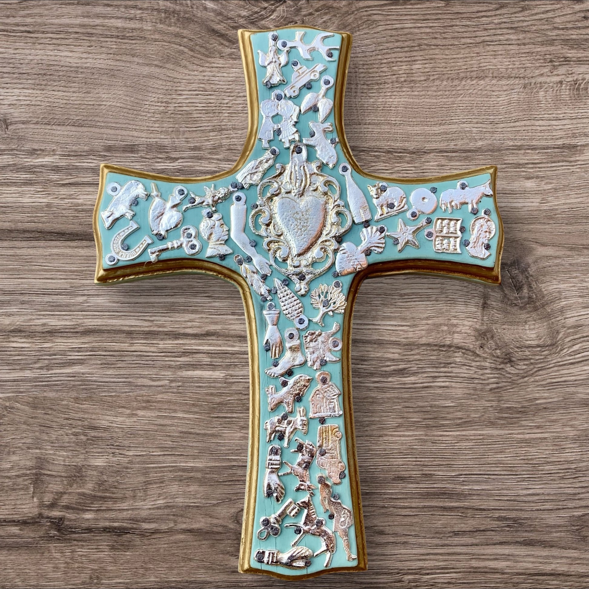 Milagros decorated wood cross teal with heart center 