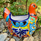 Colorful orange multi-color Mexican Talavera ceramic chicken shape planter on a natural background Right side 