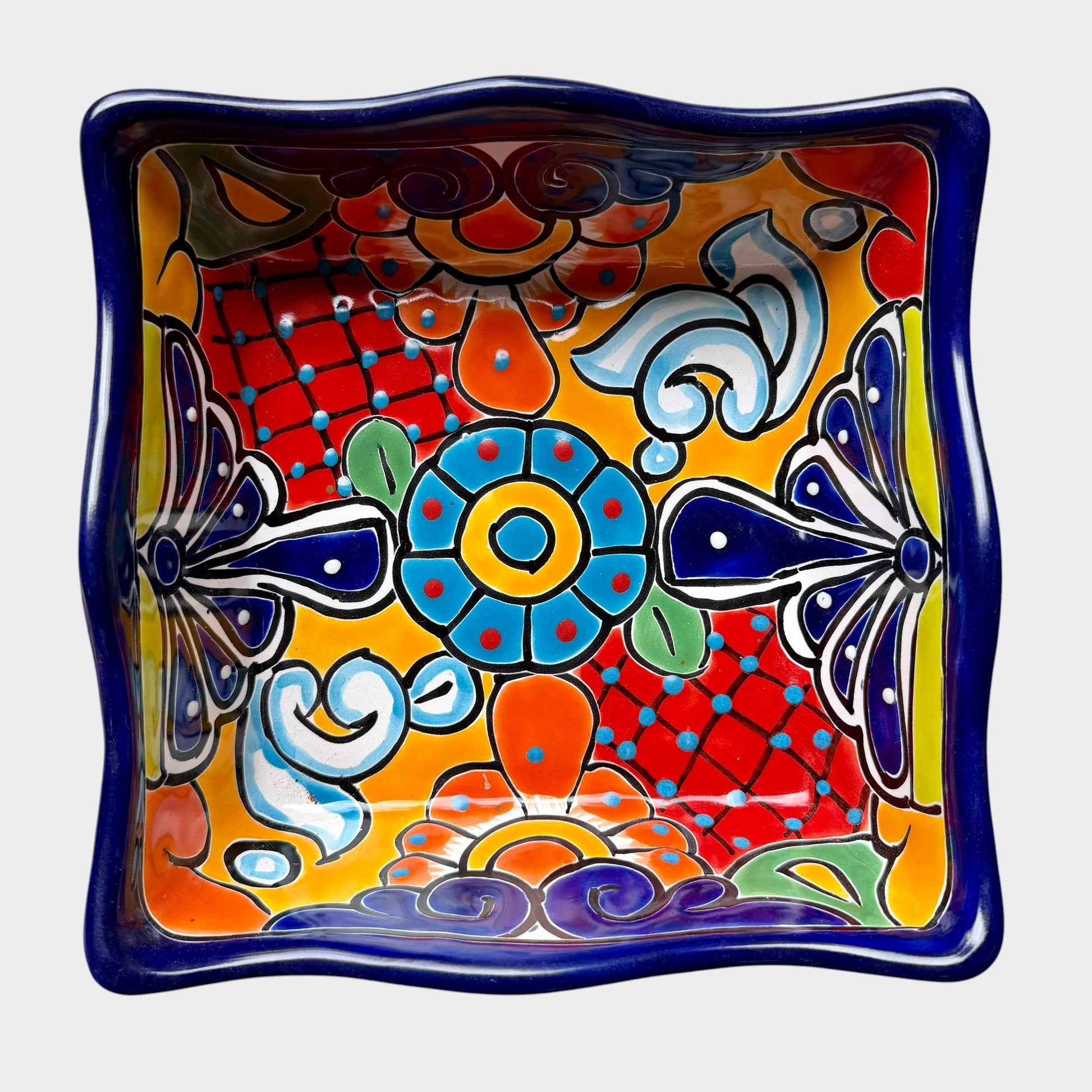 Three colorful talavera square nesting bowls with intricate patterns Large
