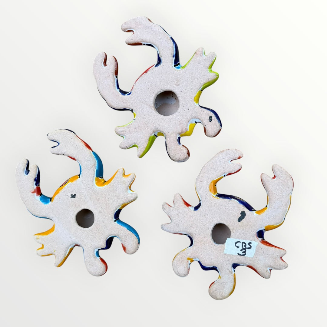 Back view of Talavera Crab set showing hanging hole.
