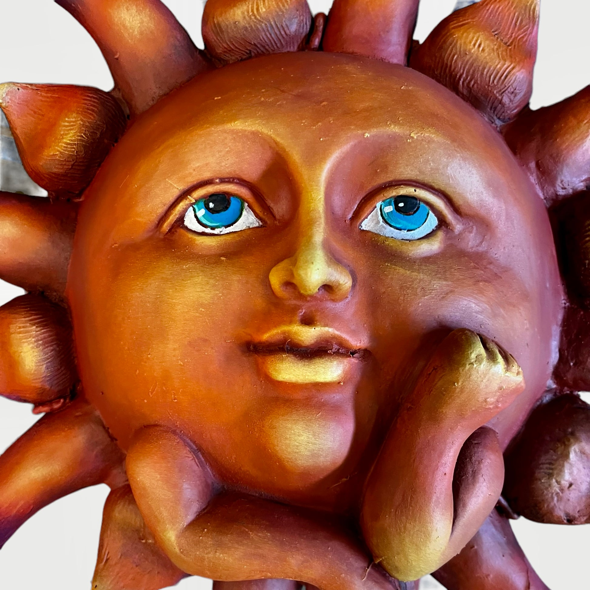 metal sun face
