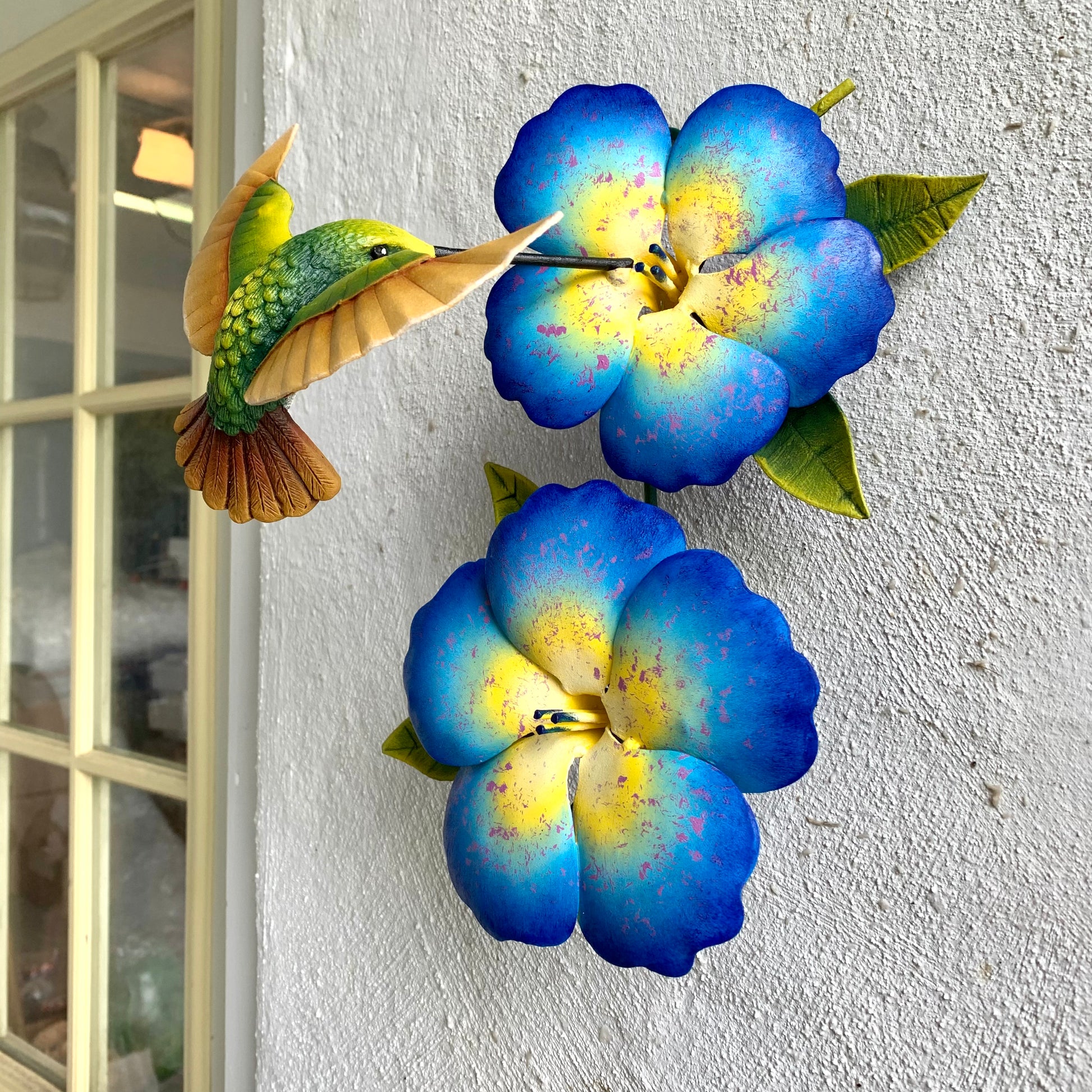 Humming bird and flower scultpure