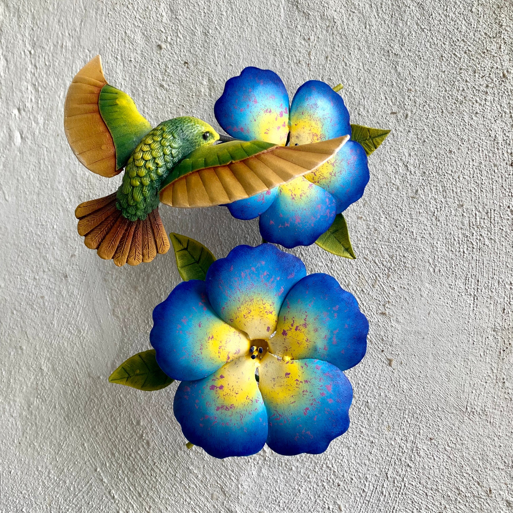 Humming bird and flower scultpure