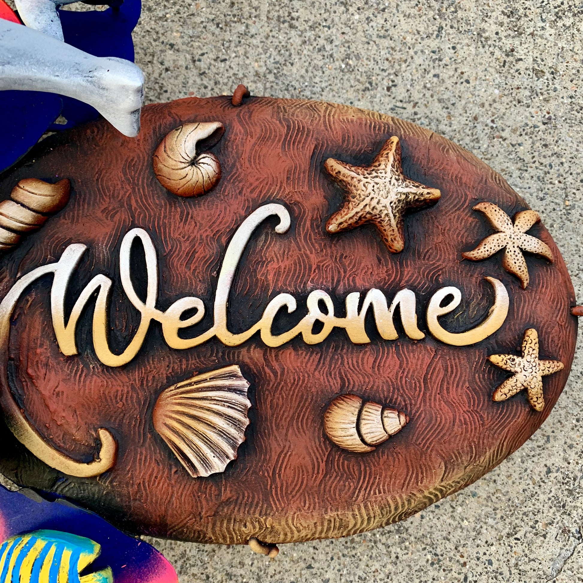 Dolphin welcome sign plaque