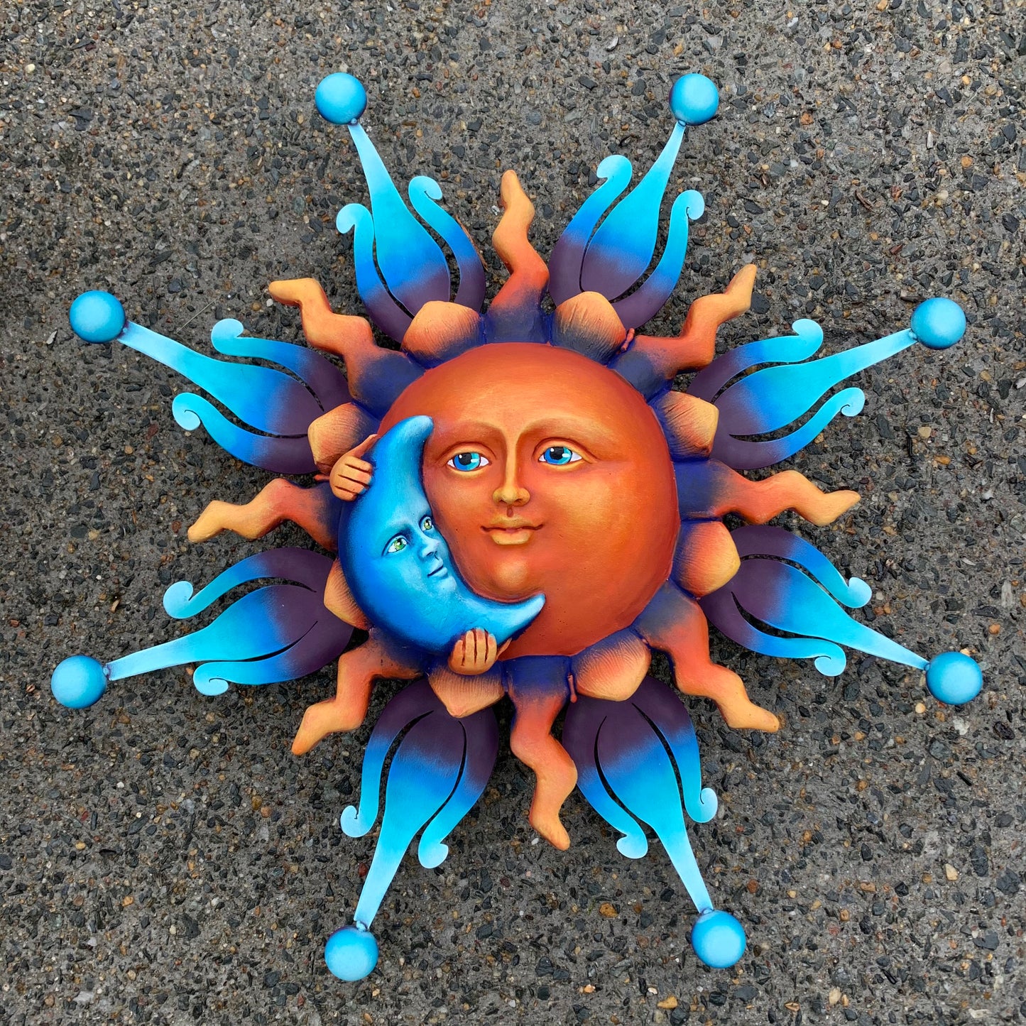 sun and moon garden sculpture