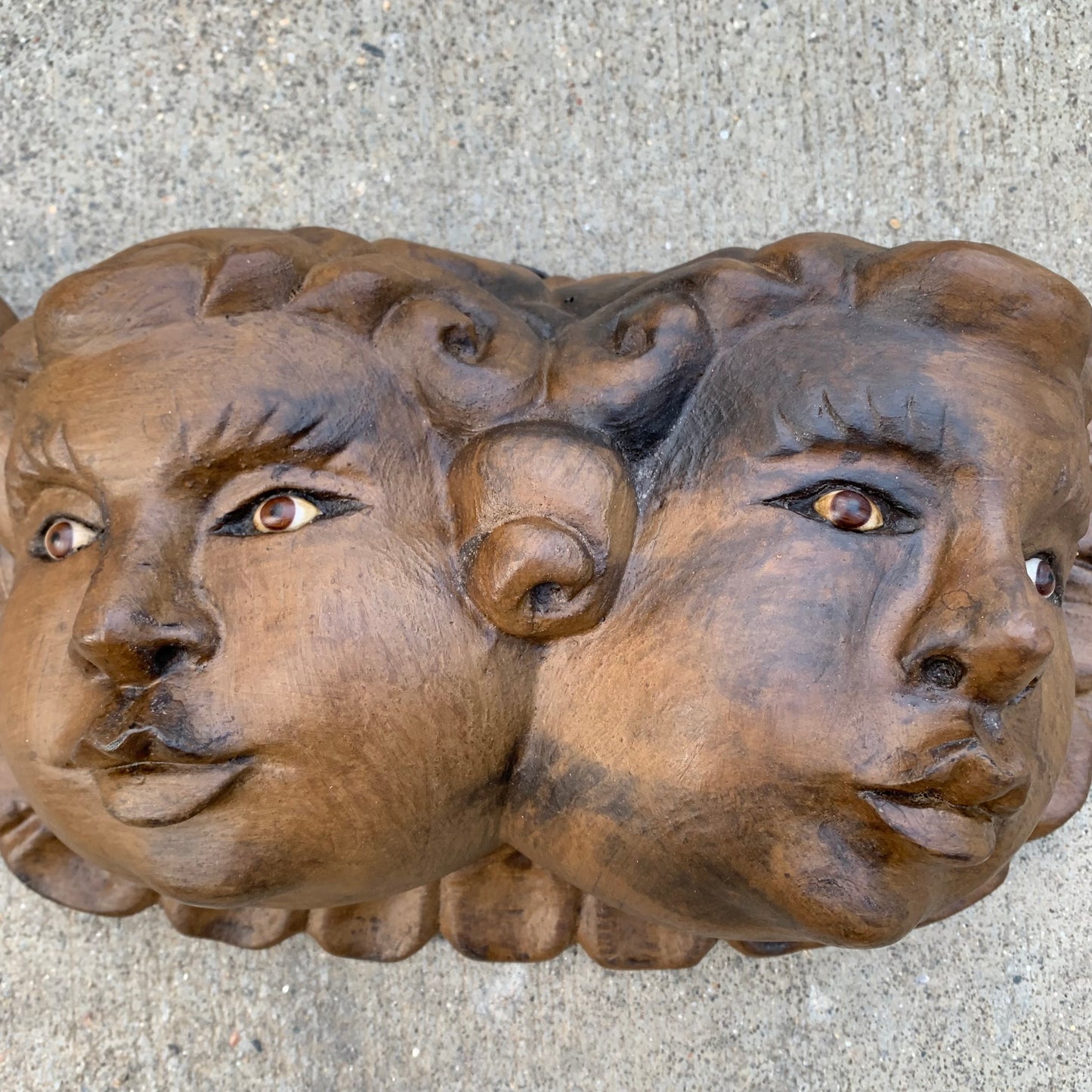 wood carved cherub face