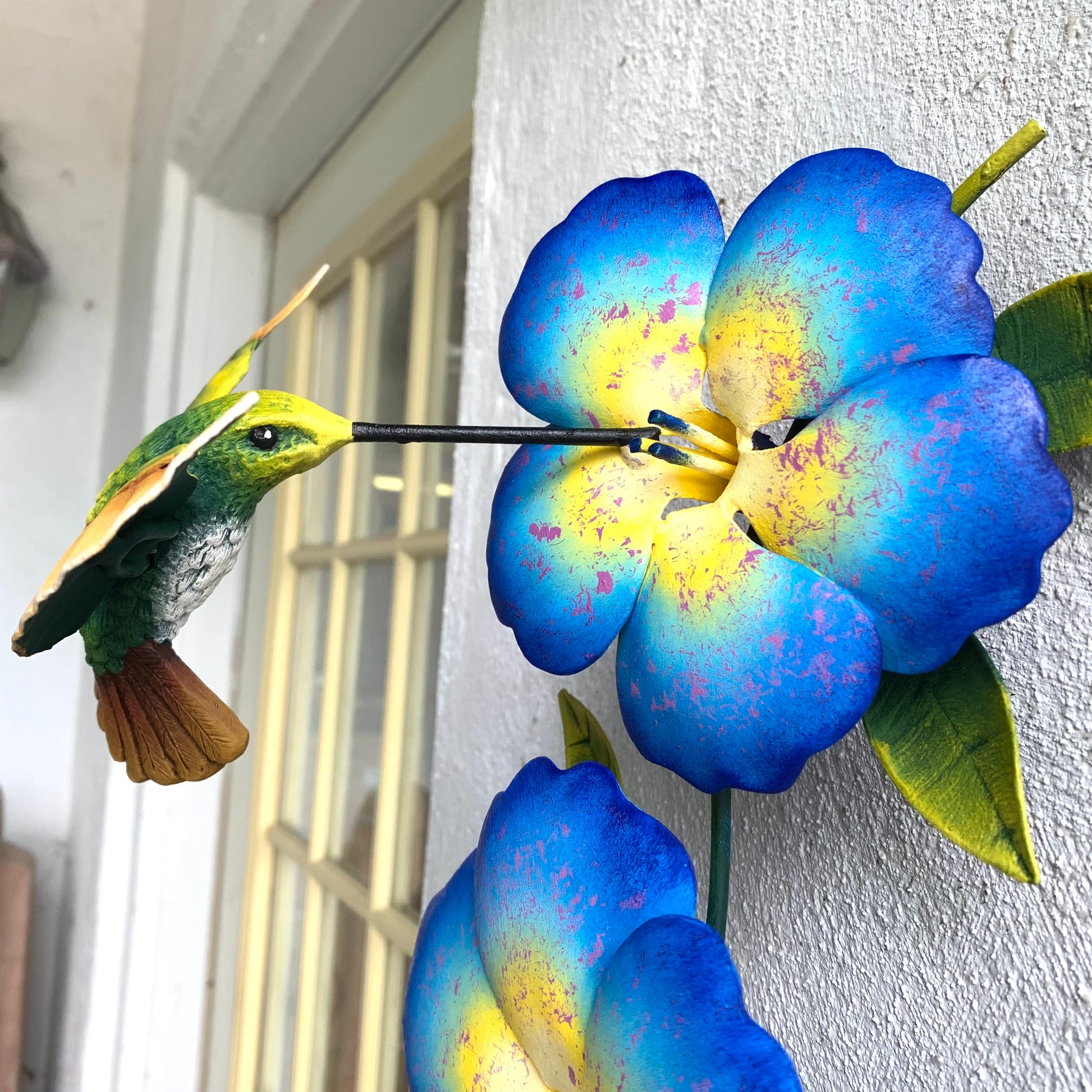Humming bird and flower scultpure